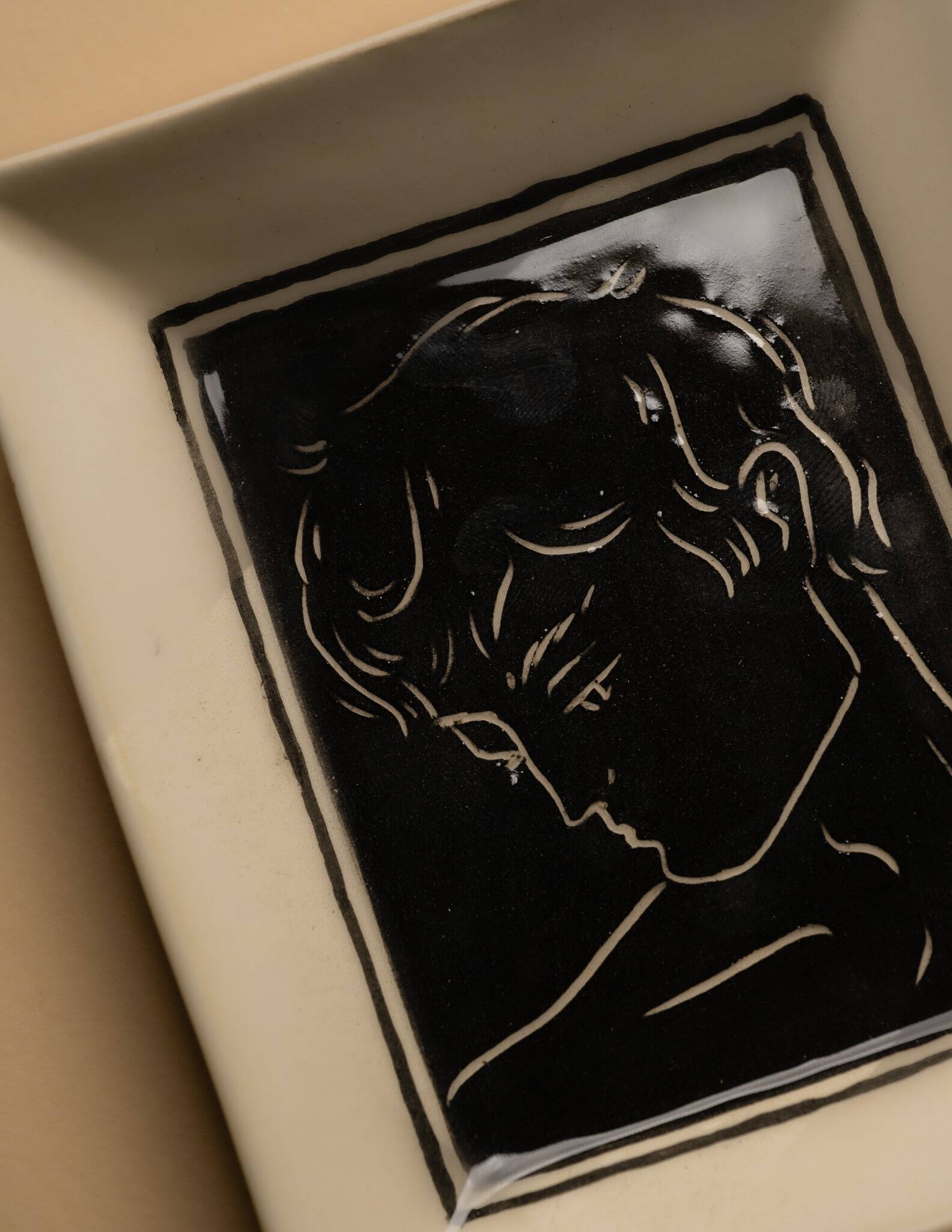 Vide-poche en céramique noire et blanche