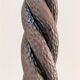 Pair of sculptural cast iron chenets with twisted heads