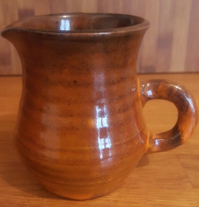 Ceramic milk pot creamer with orange glaze