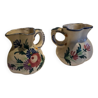 Pair of St Clement pitchers
