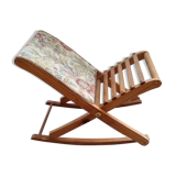 Wooden footrest and vintage tapestry