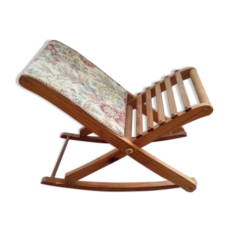 Wooden footrest and vintage tapestry