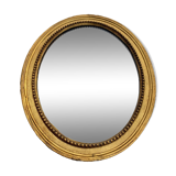 Antique gilded oval mirror