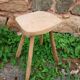 Antique stool in raw wood