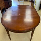 Louis XVl style round table in cherry with extensions