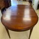 Louis XVl style round table in cherry with extensions