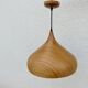 Scandinavian metal pendant light with a faux wood finish, 1980s.