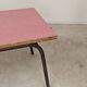 Large canteen table in pink formica and metal.