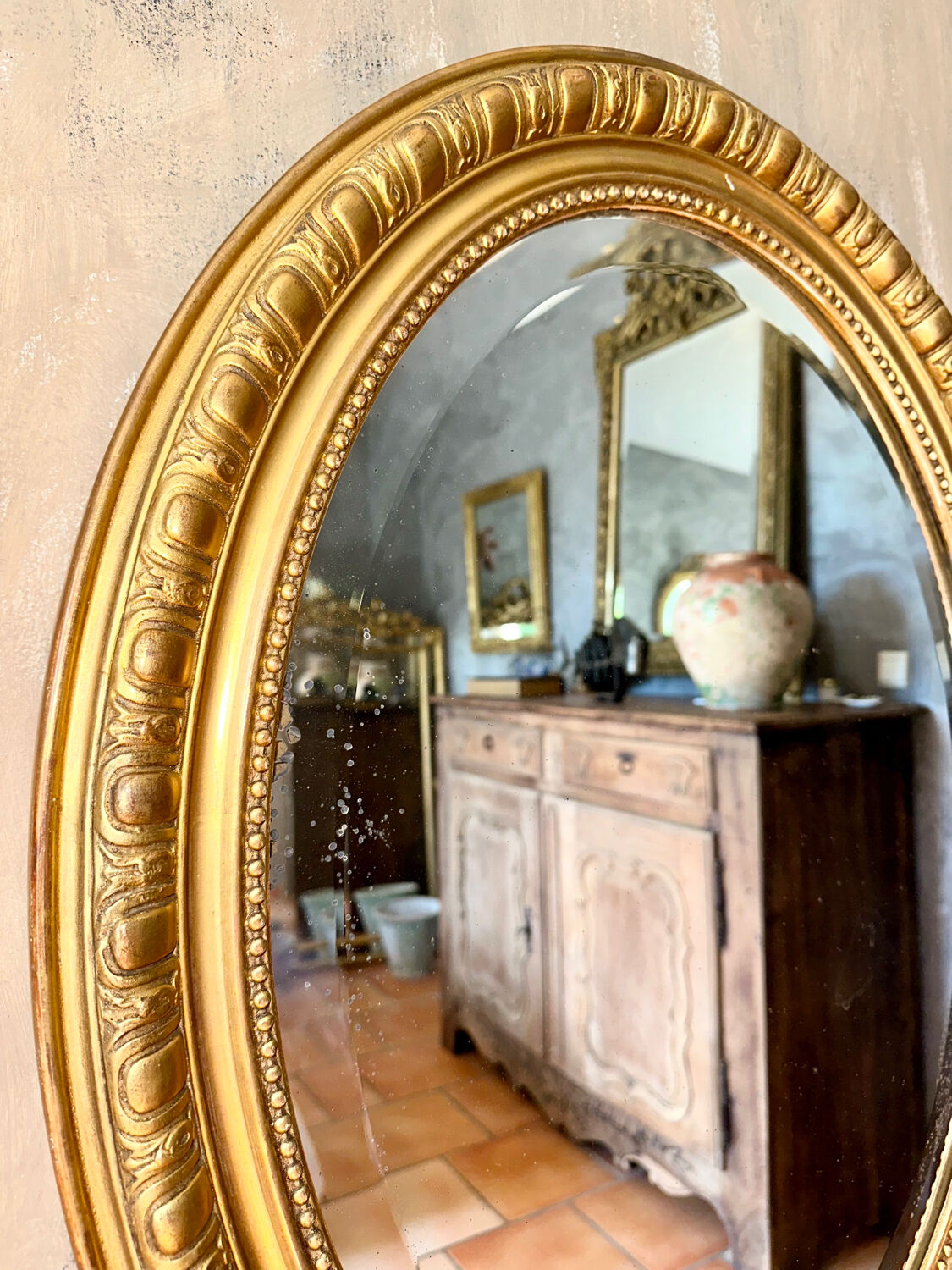 Old oval mirror late nineteenth