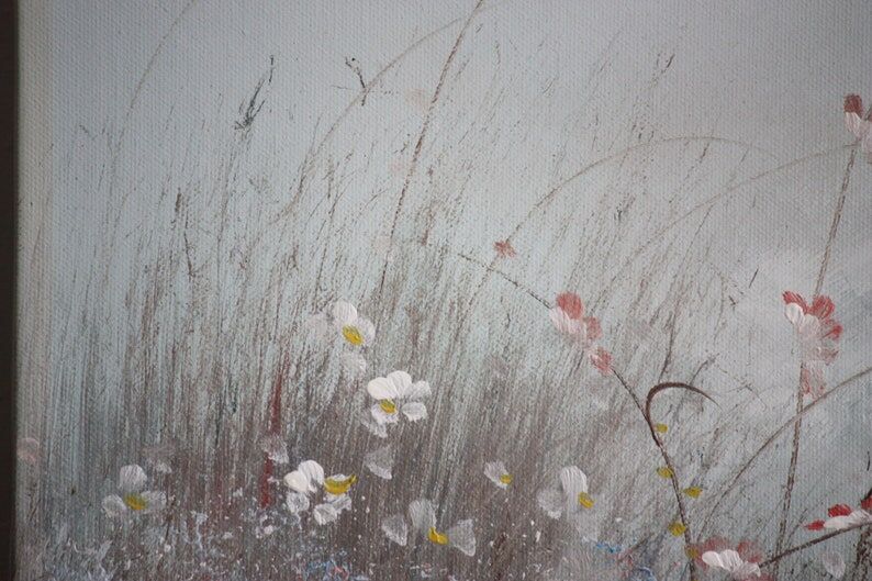 Painting on canvas flowers in meadow
