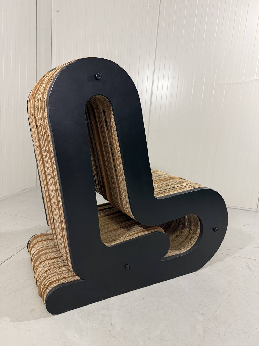 Sculpted cardboard & plywood lounge chair, 1990’s