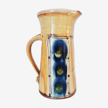 Yellow and blue enamel terracotta jug