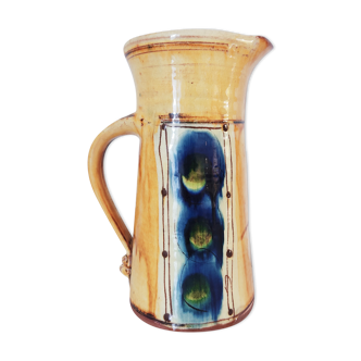 Yellow and blue enamel terracotta jug