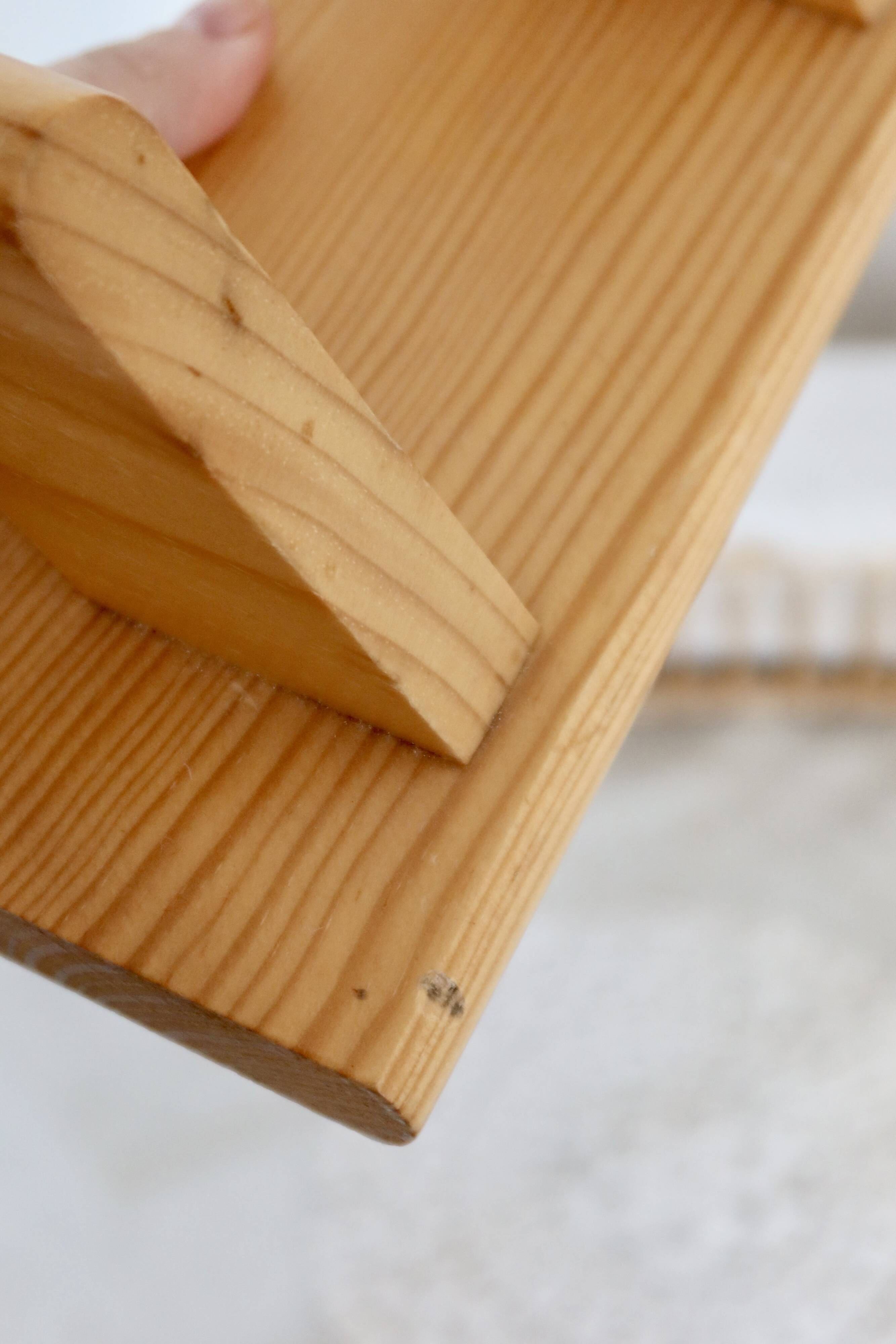 Vintage wall coat rack in pine with 3 hooks.