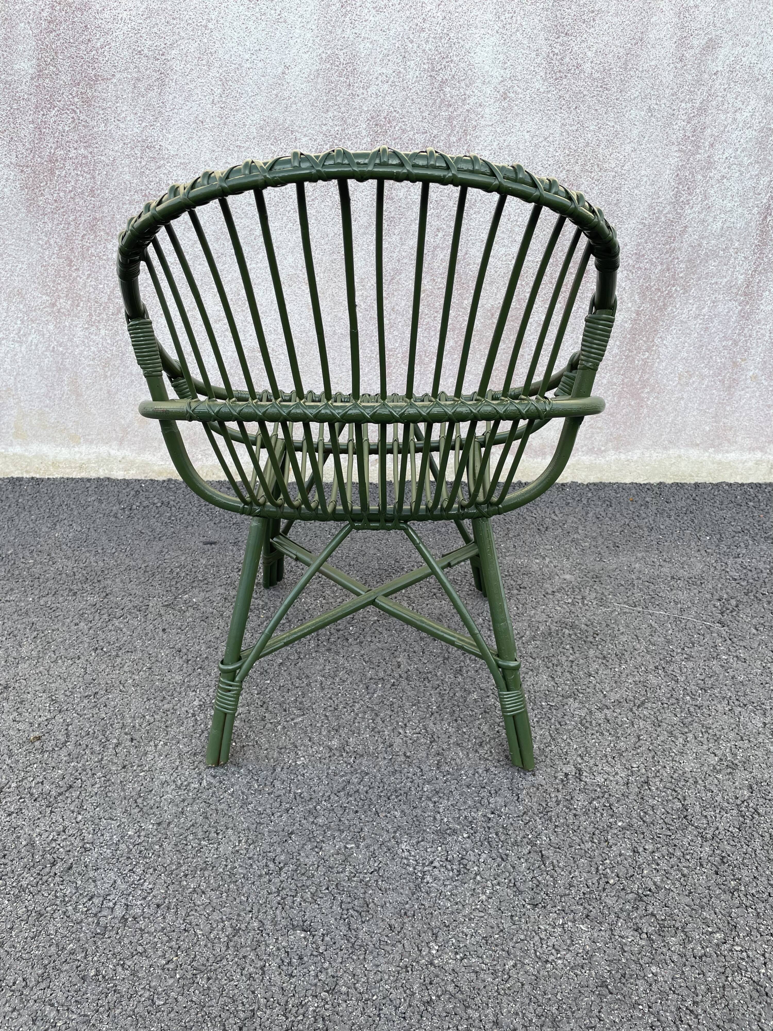 Green rattan armchair