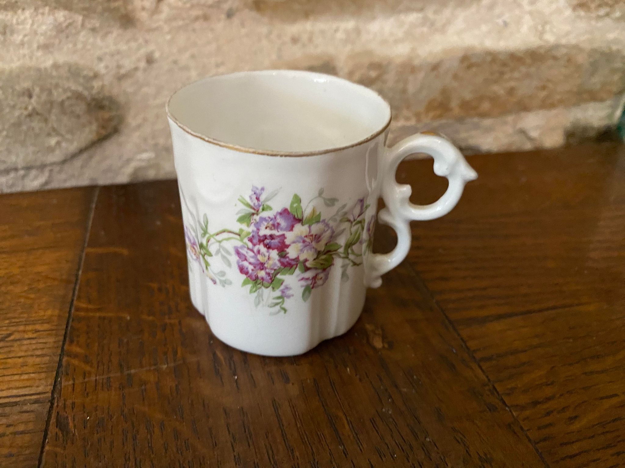 Porcelain cup fine decoration flowers and golden edge