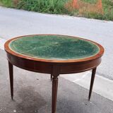 Round table with Louis XVI style extensions