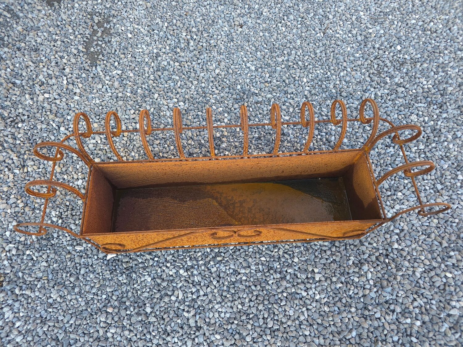 Wrought iron wall planter