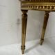 Louis XVI style armchair in wood and gilded stucco, 20th century.