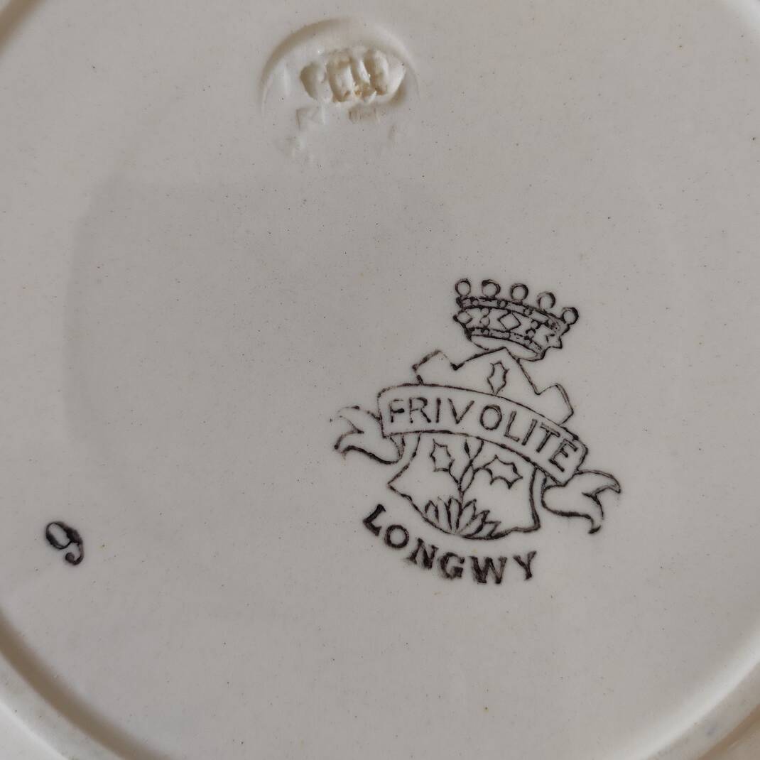 7 Old Longwy plates