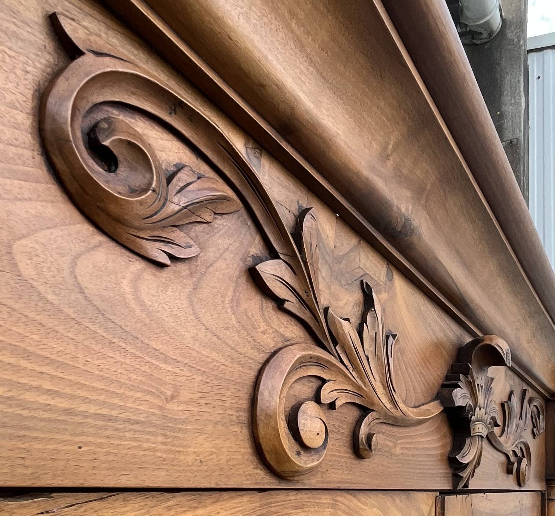 Empire wardrobe in solid walnut, France, mid-19th century.