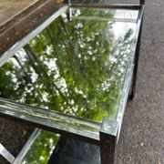 Vintage rolling bar from the 1970s in chrome metal and mirror.