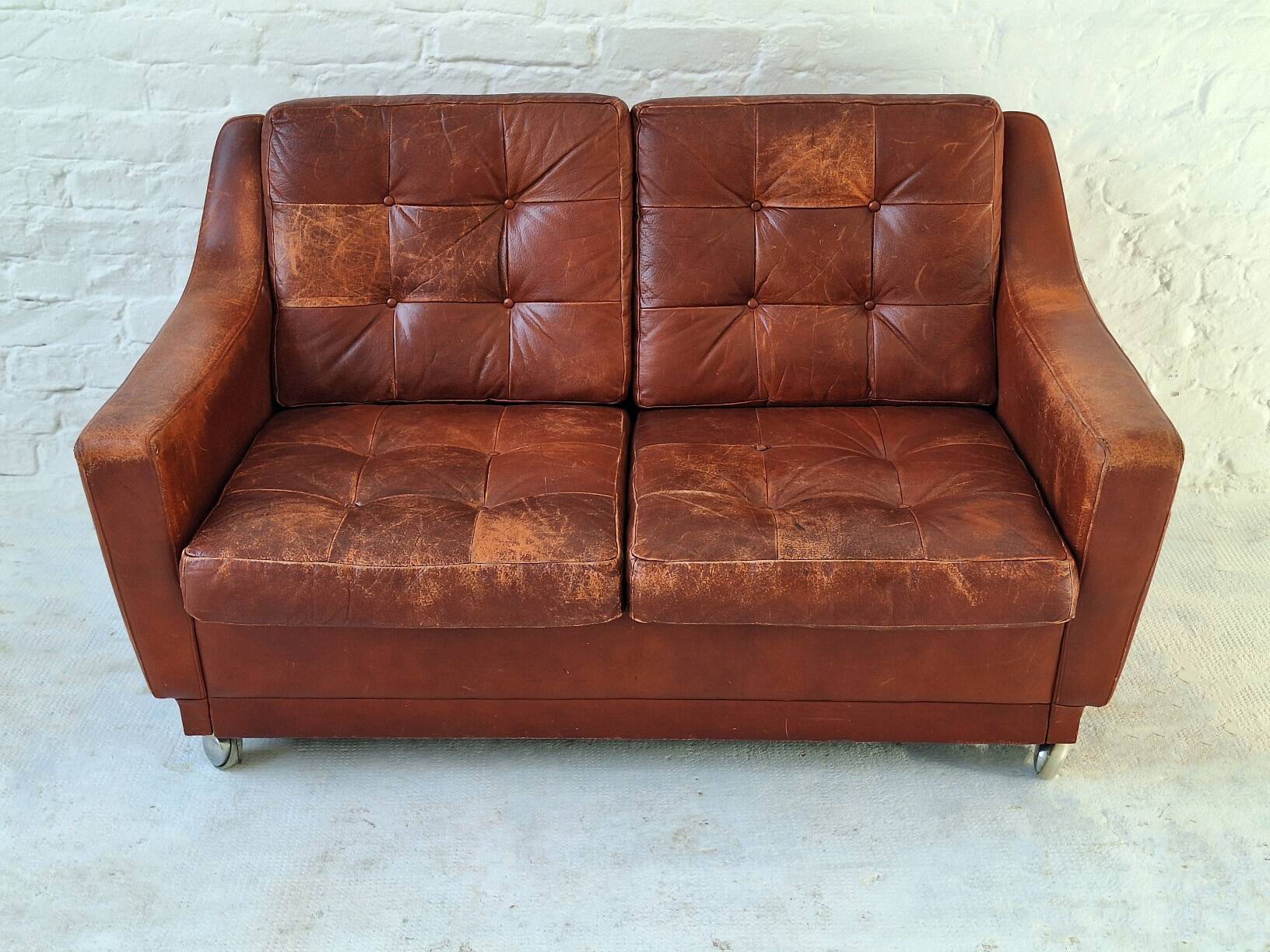 Mid century patchwork tufted patinated leather sofa, 1960s