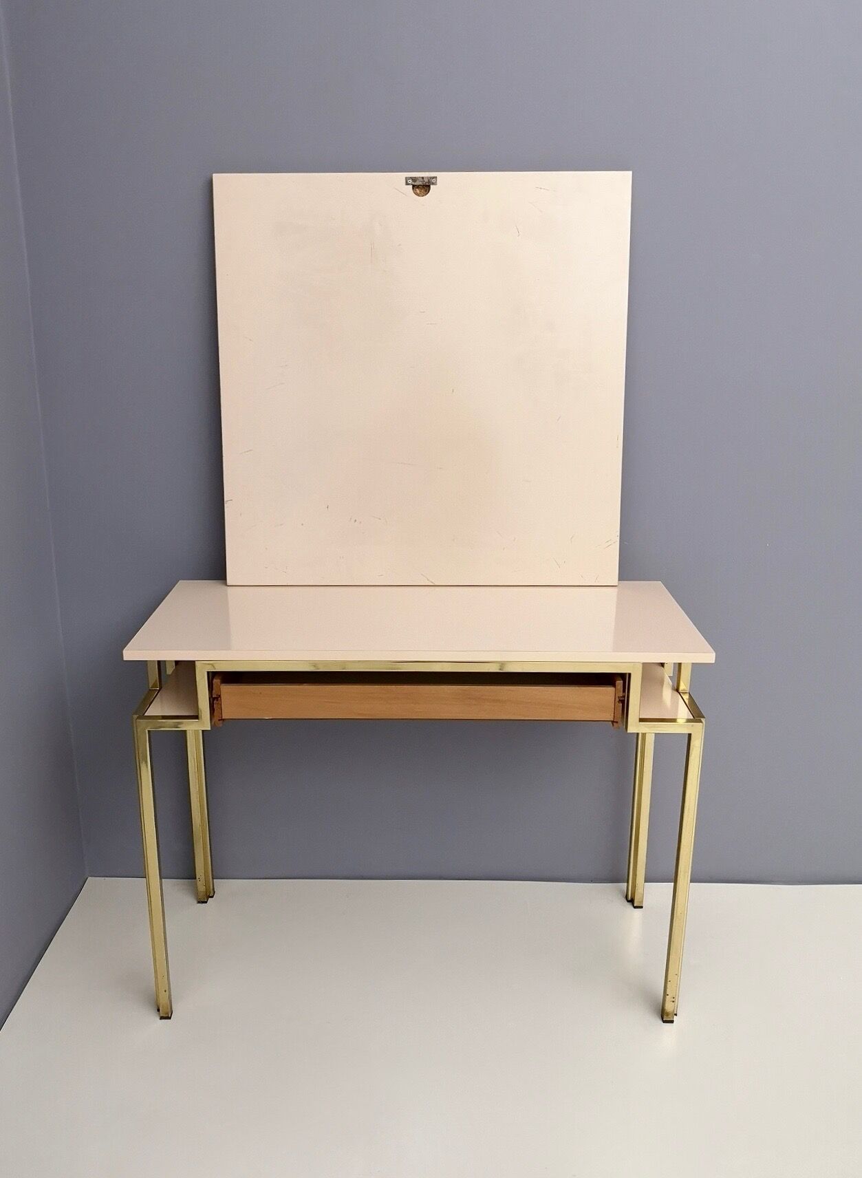 Postmodern pale pink formica and brass console with wall mirror, italy