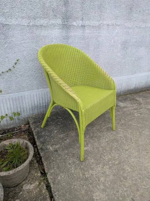 Lime green wicker armchair