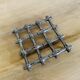 Silver metal table mat imitating bamboo
