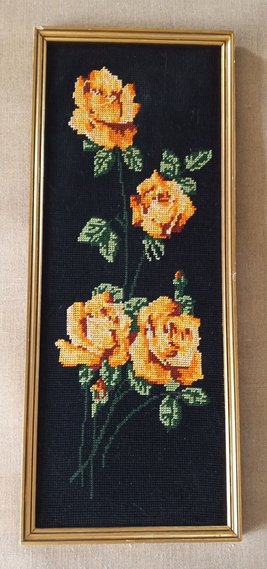 Golden frame with ancient canvas of yellow roses