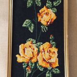 Golden frame with ancient canvas of yellow roses