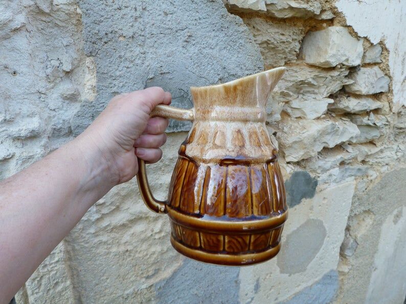 Former wine pitcher in glazed earth style bistrot auberge