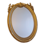 Antique large oval beveled mercury mirror