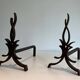 Pair of Wrought Iron Andirons with Stylised Flamboyant Uprights and Enrobed Feet