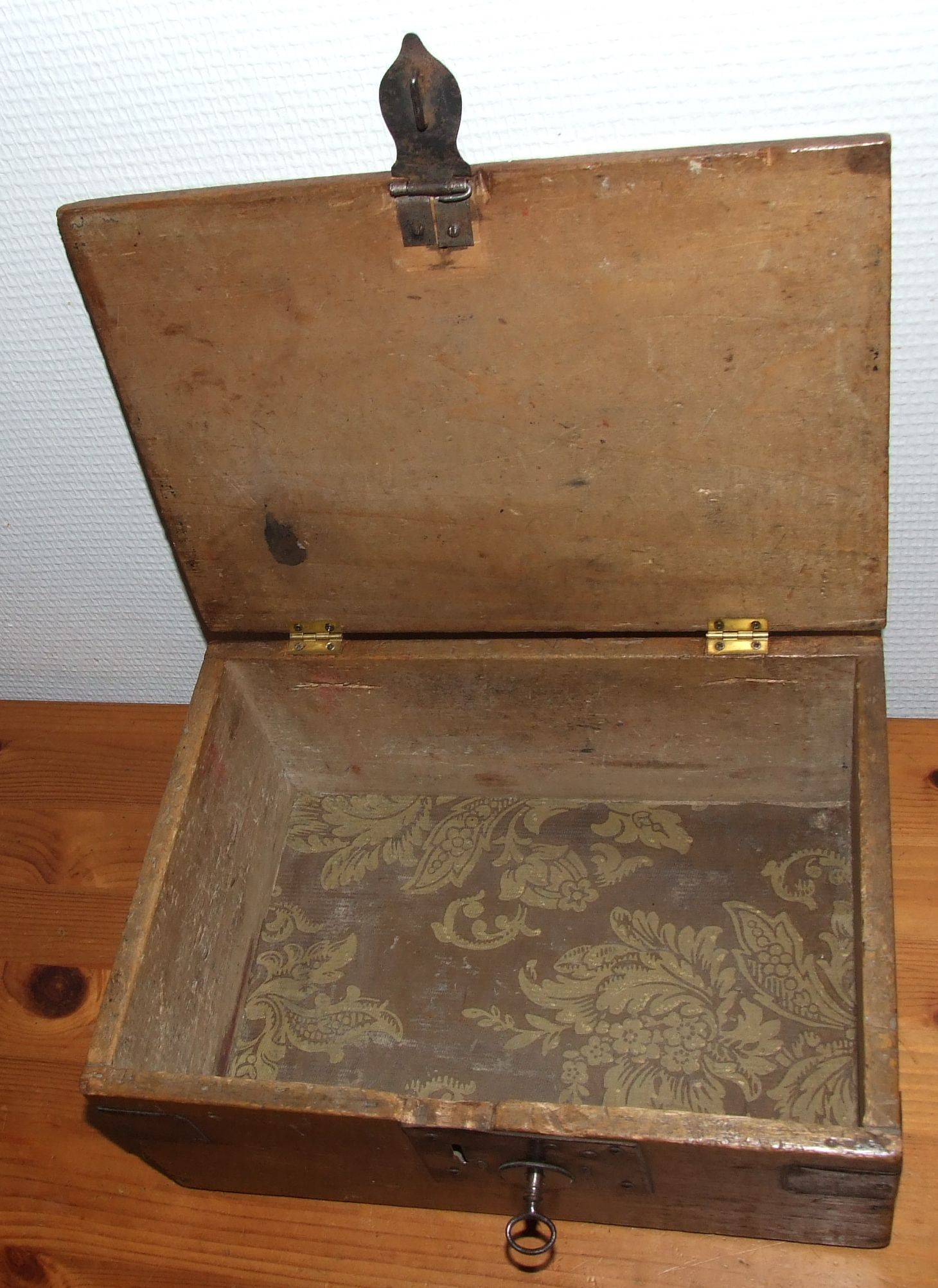 Old box with inscription, fittings, lock and key