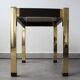 Pair of Hollywood Regency style brass side tables, 70s.