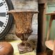 Médicis vase in cast iron with damage and missing parts.