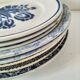 8 assiettes dépareillées en terre de fer bleue, 19ème