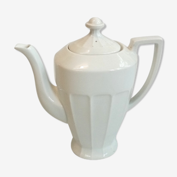 White coffee maker made of old porcelain