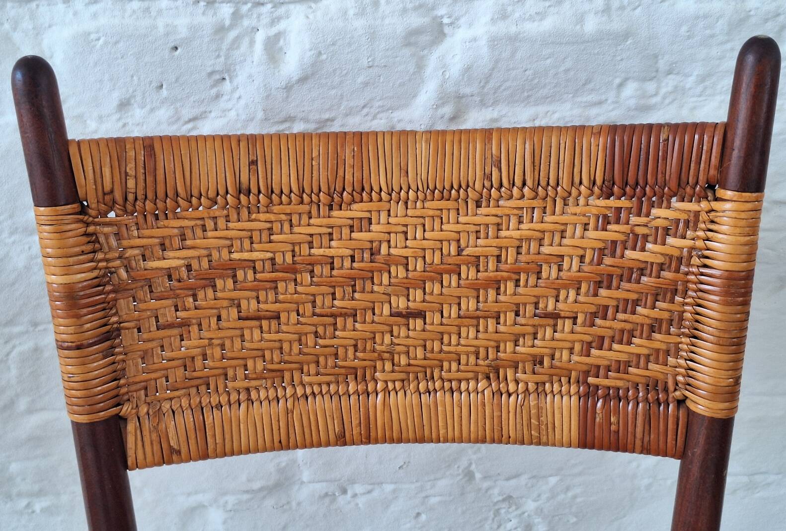 Four teak dining chairs with patinated cane after Gio Ponti, Italy 1960s