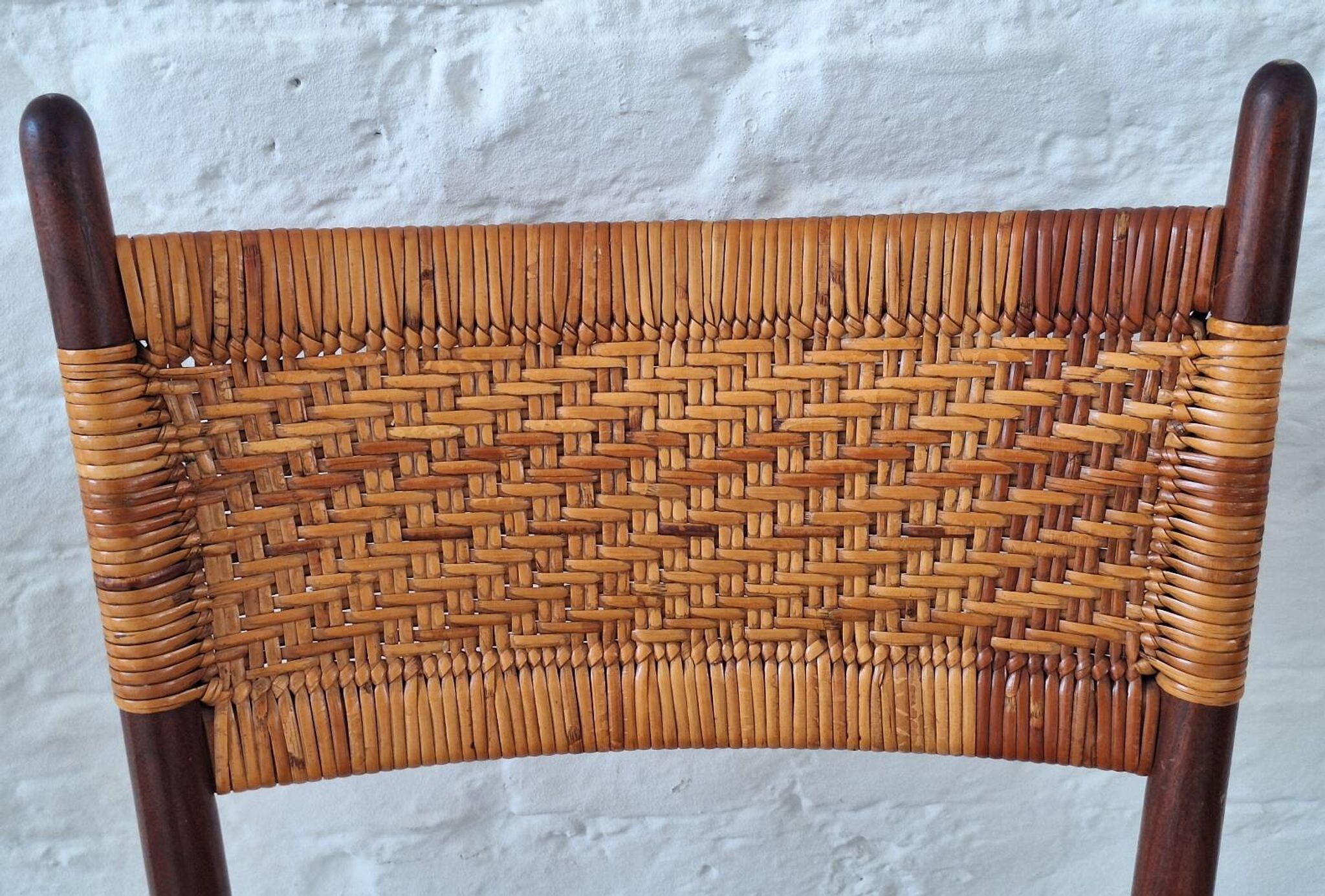 Four teak dining chairs with patinated cane after Gio Ponti, Italy 1960s