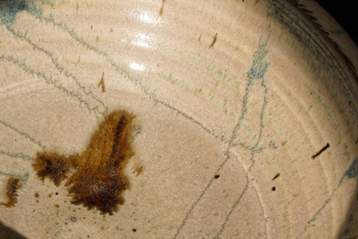 Hollow stoneware dish, signed Yves Loiselet