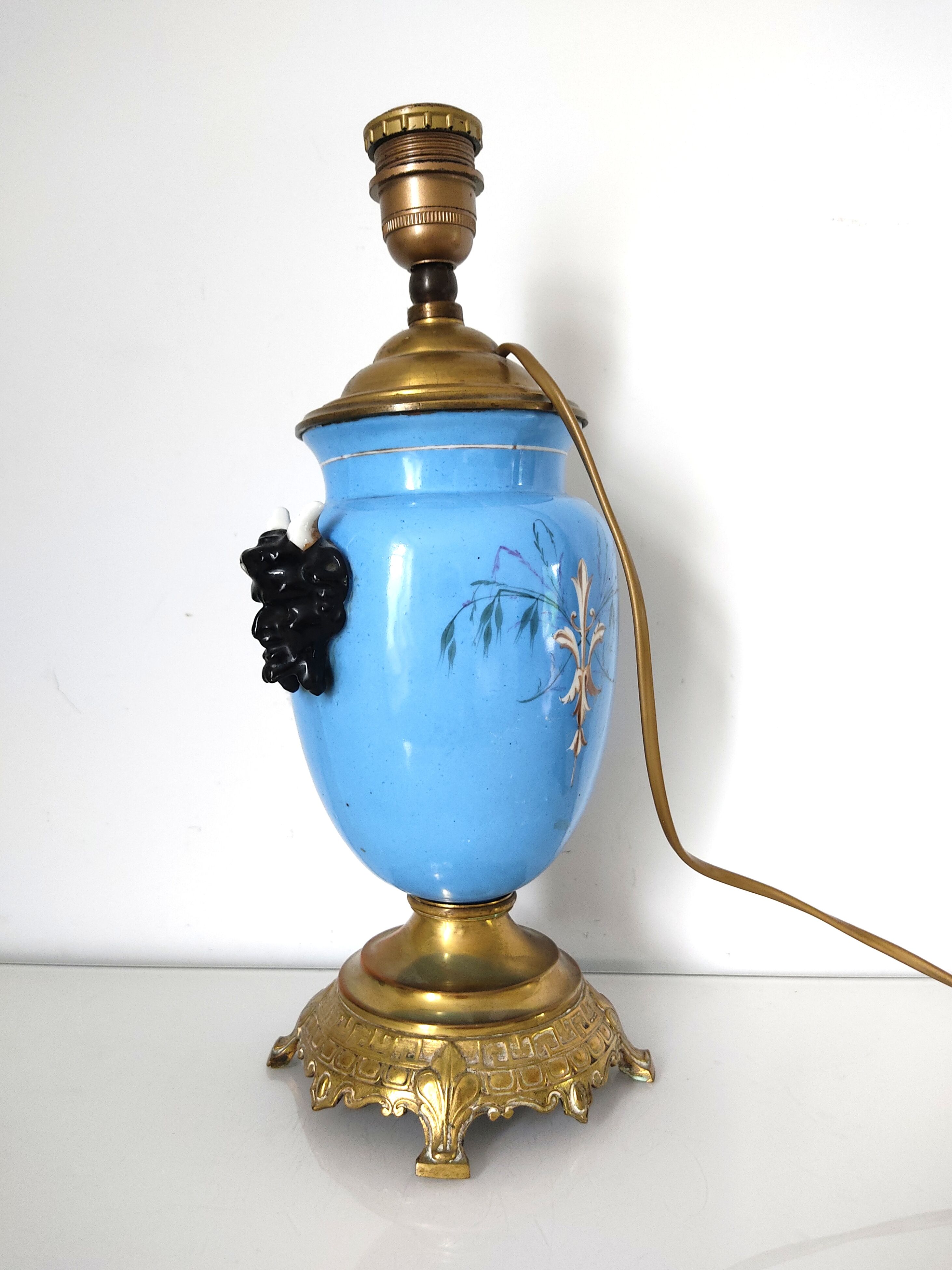 Lamp foot blue vase heads of fauna