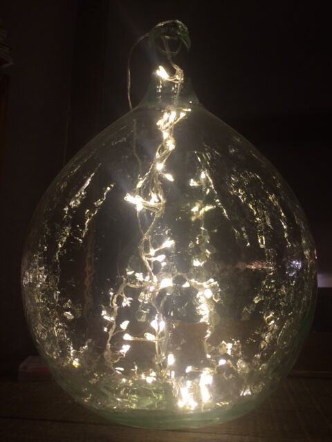 Transparent old demijohn about 8 to 10 L