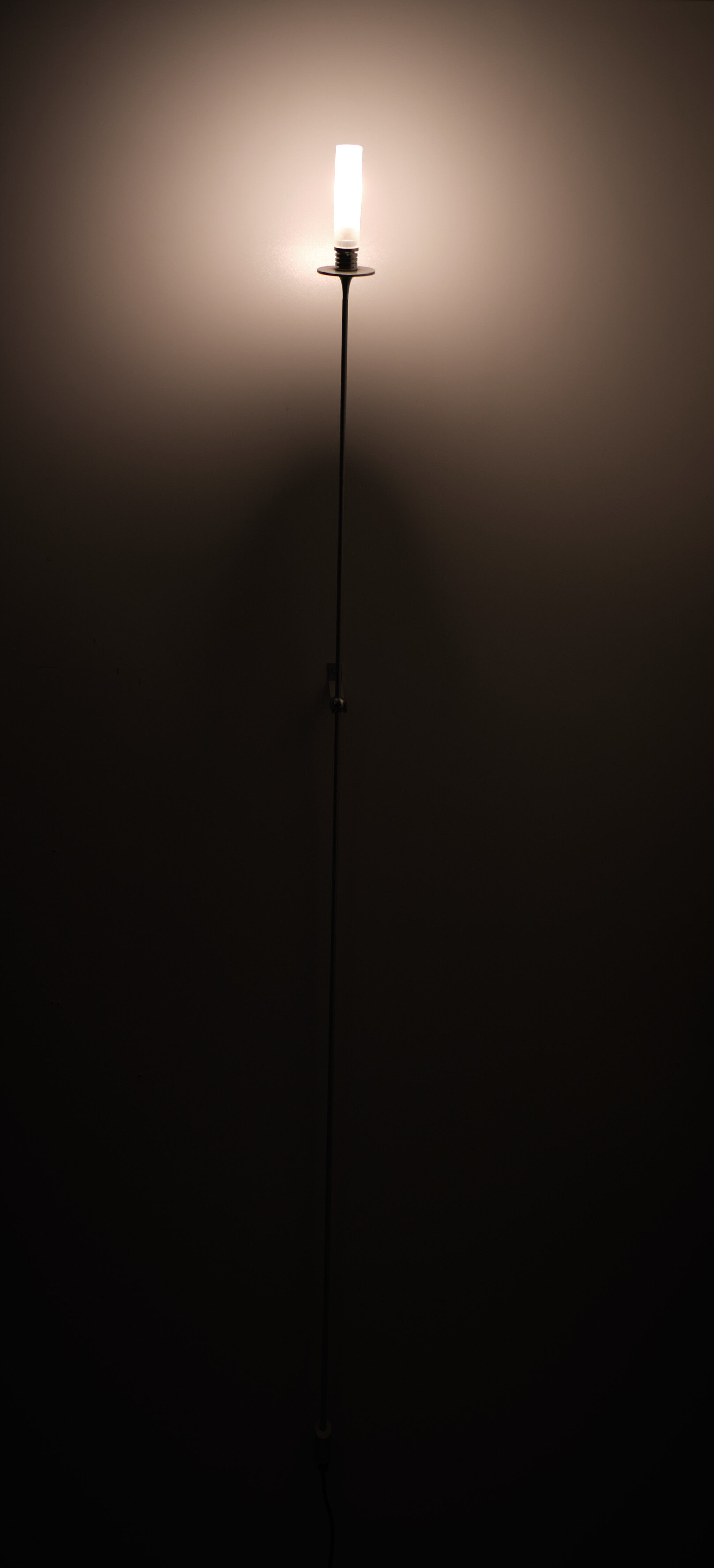 Sleek tall Halogen Wall lamp Occhio Italy