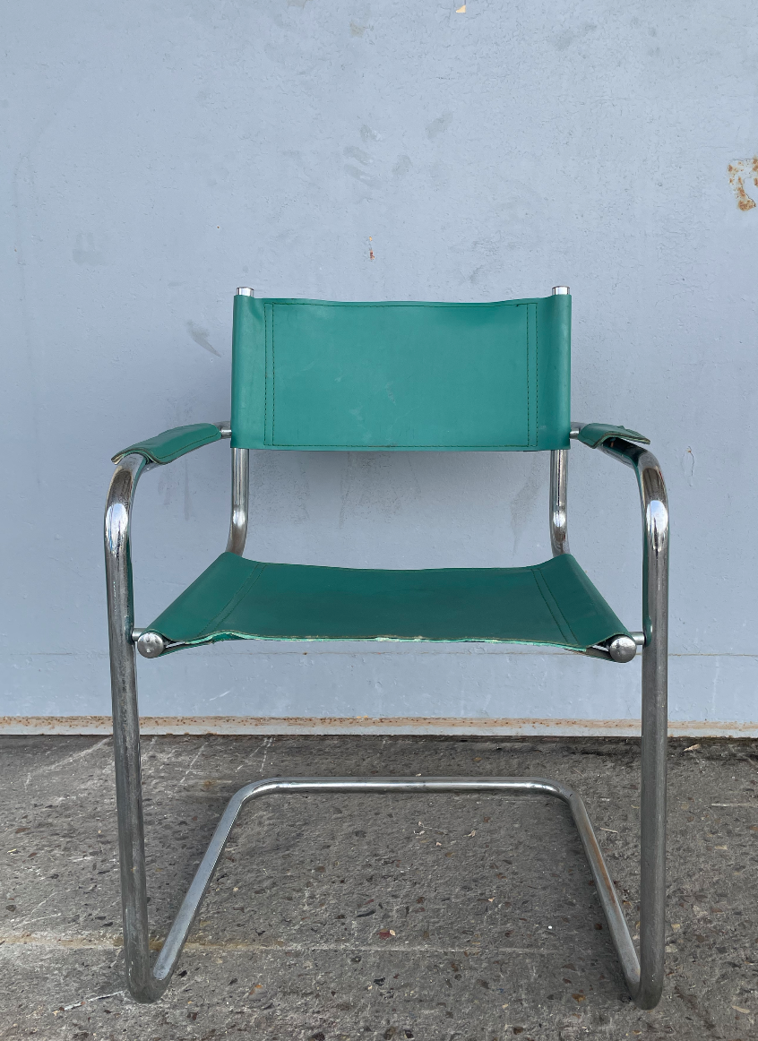 Green leather armchair
