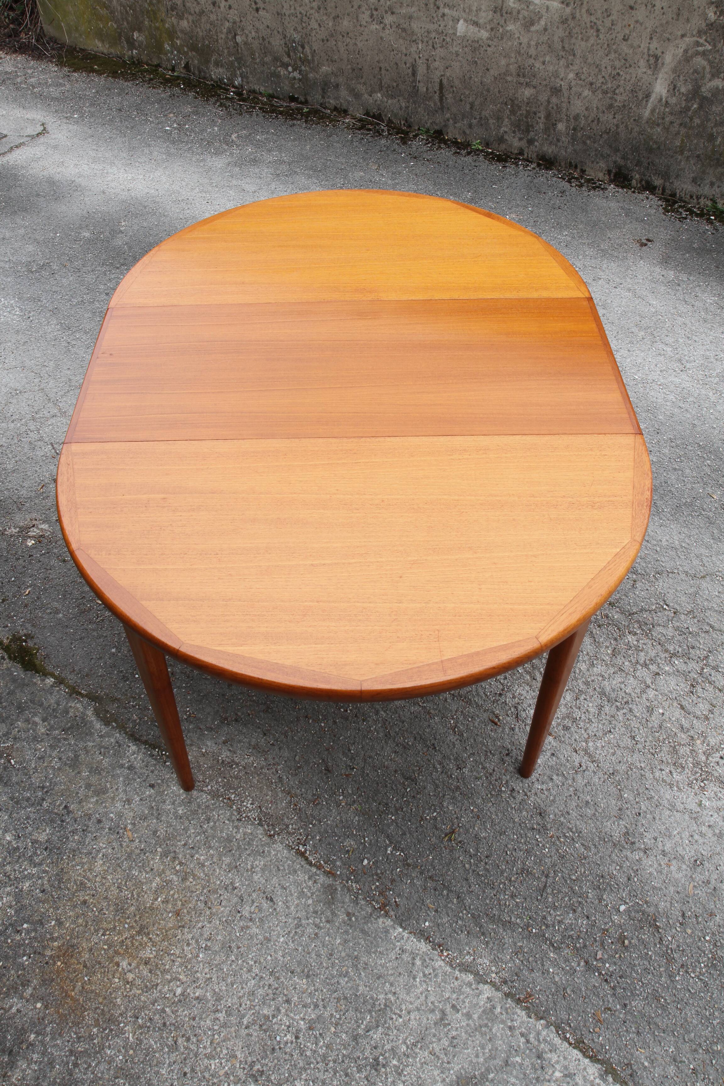 Danish teak extendable round table of the years 60