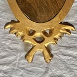 Vintage Empire style wall mirror in gold resin