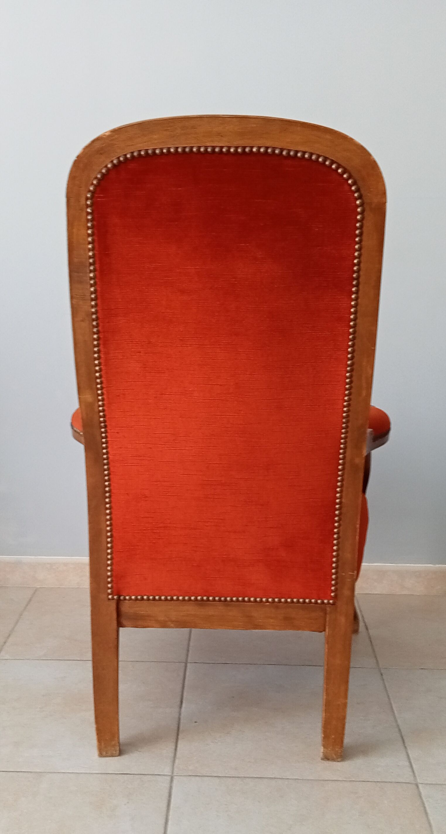 Walnut and velvet voltaire armchair
